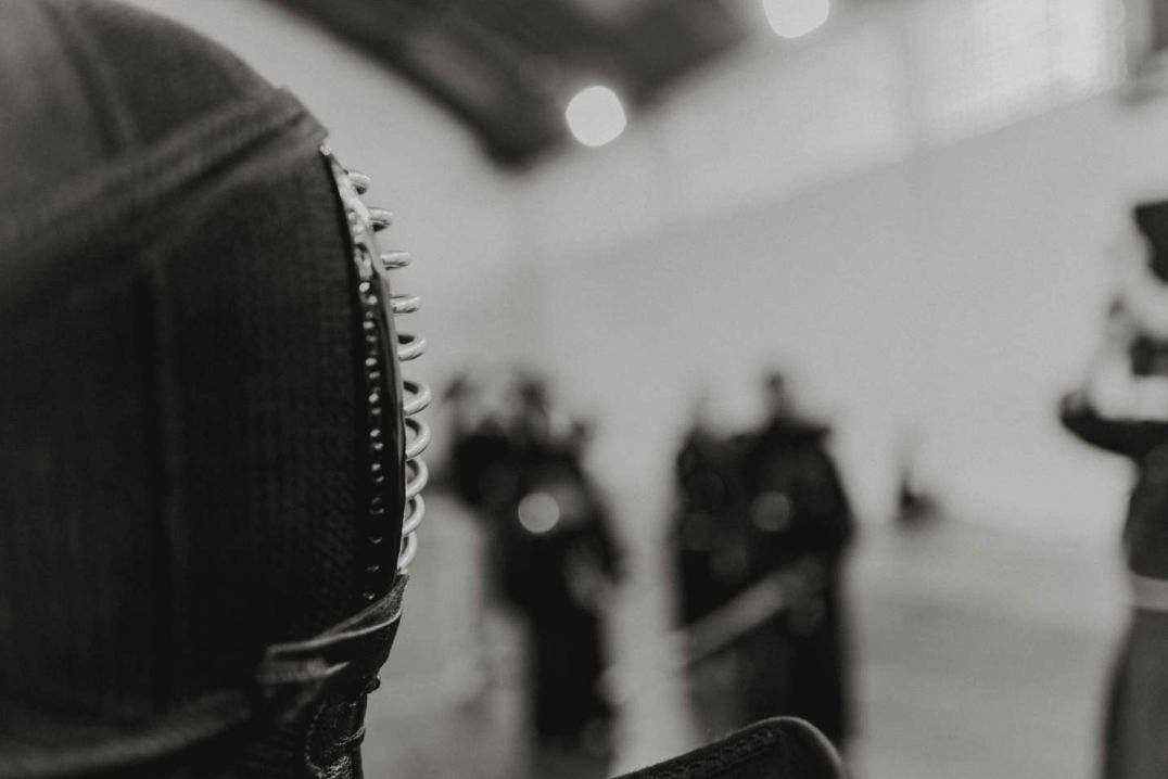 Compact R3 training mitts on black background